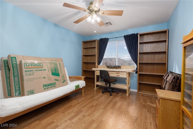 office space with hardwood / wood-style floors and ceiling fan