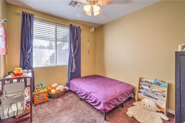 bedroom featuring carpet and ceiling fan