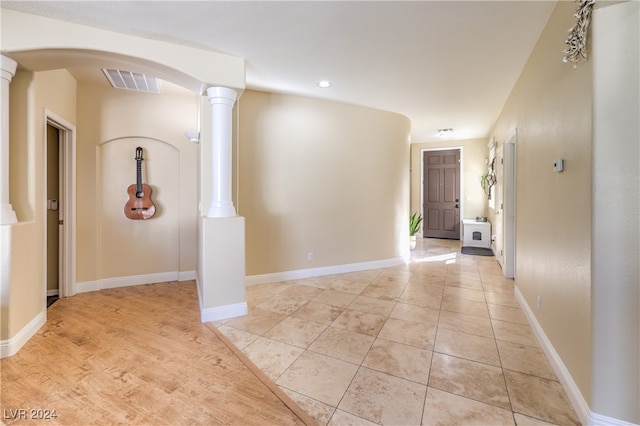 foyer entrance with ornate columns