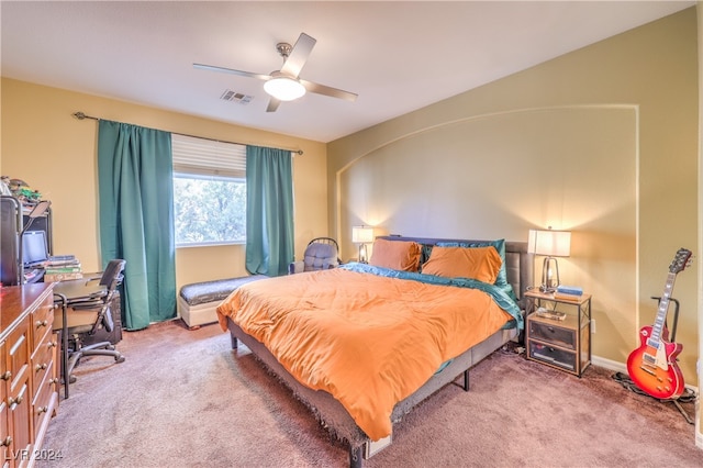 carpeted bedroom with ceiling fan