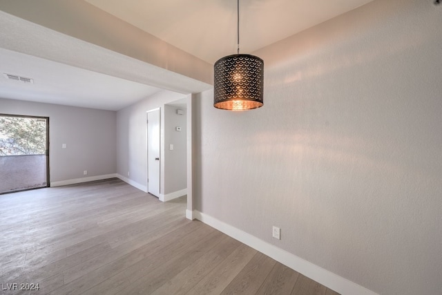 unfurnished room featuring light hardwood / wood-style flooring