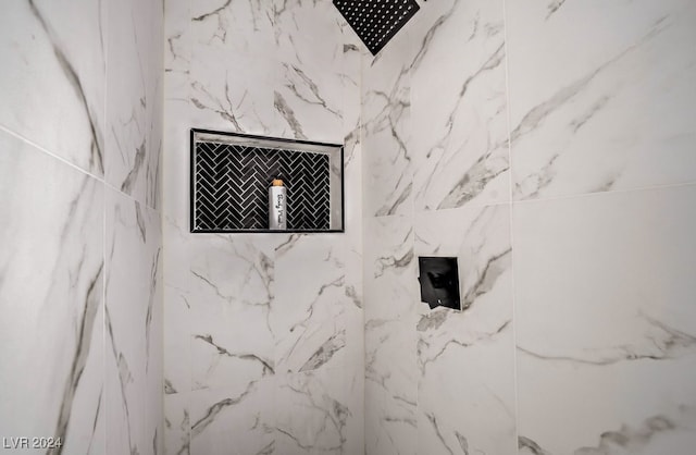 interior details with tiled shower