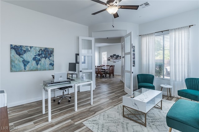 office area with ceiling fan and hardwood / wood-style flooring