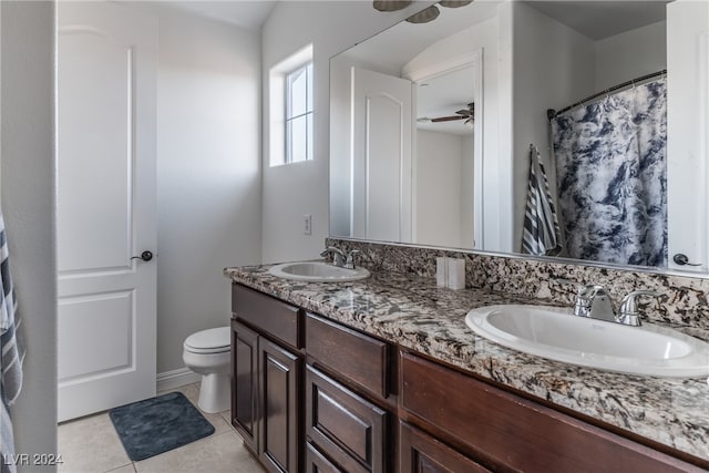 bathroom with vanity, ceiling fan, toilet, and tile patterned floors