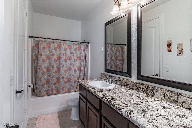 full bathroom with vanity, toilet, shower / tub combo, and tile patterned flooring