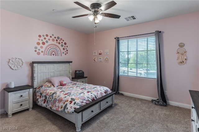 carpeted bedroom with ceiling fan