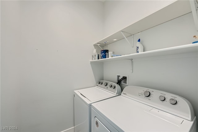 laundry room with separate washer and dryer