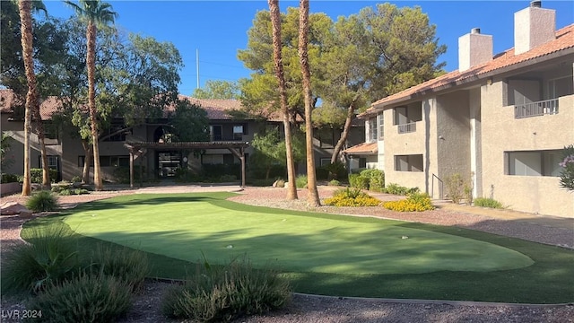 view of property's community featuring a pergola