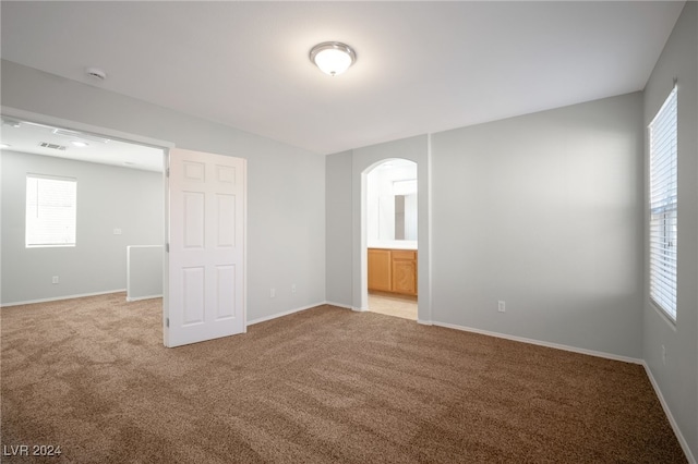 view of carpeted spare room