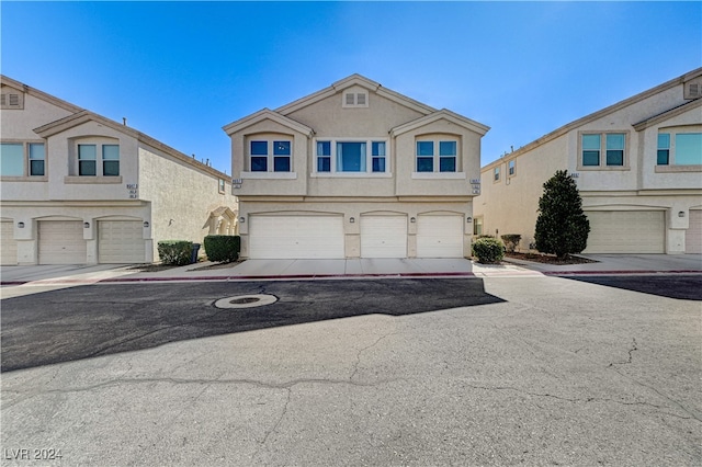 view of property with a garage