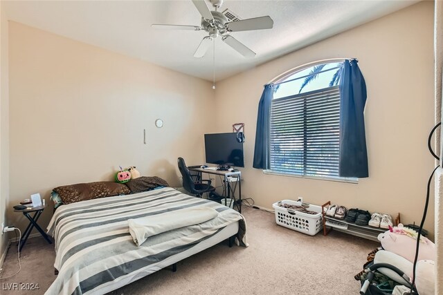 bedroom featuring carpet and ceiling fan