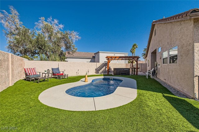 view of pool with a pergola, a patio area, and a lawn