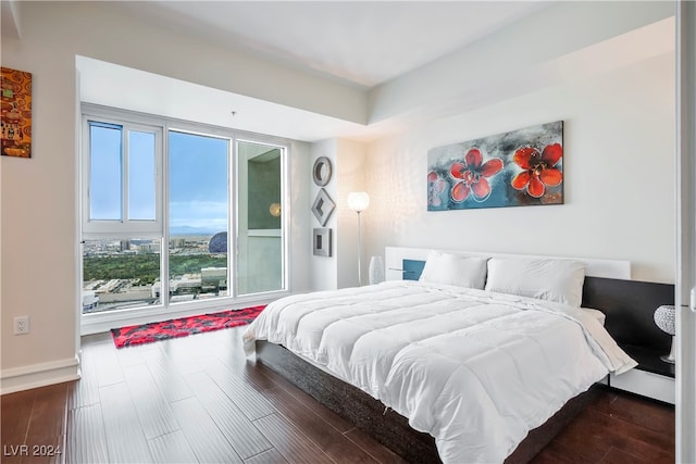 bedroom featuring dark wood-type flooring