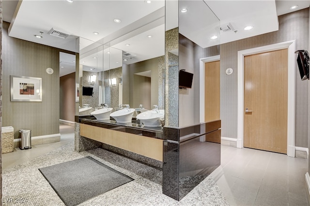 bathroom with vanity and tile patterned floors