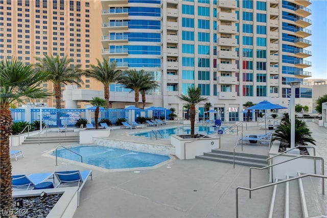 view of pool featuring a hot tub