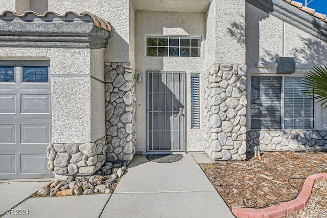 entrance to property with a garage