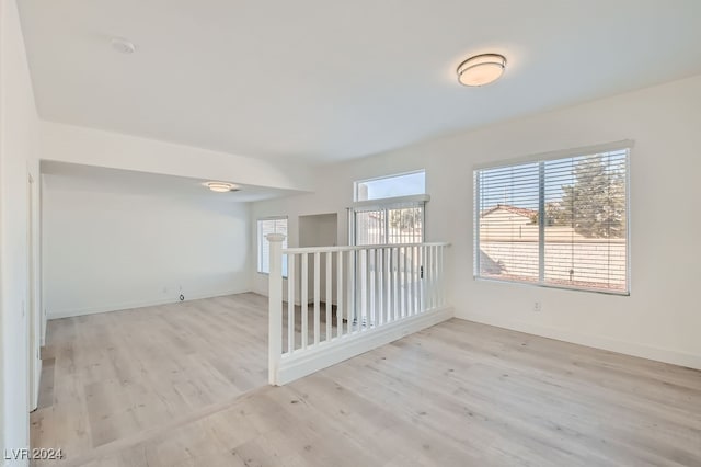 empty room with light wood-type flooring