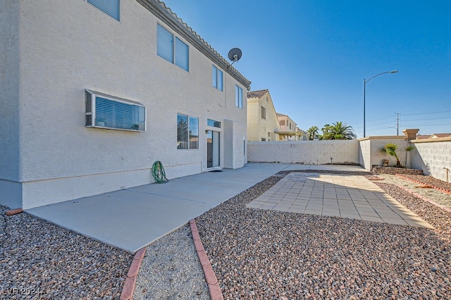 rear view of property with a patio