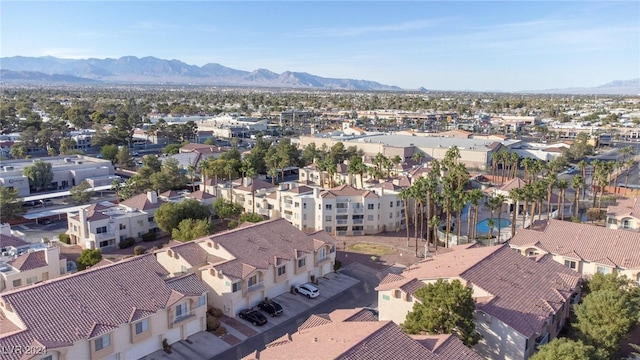 birds eye view of property featuring a mountain view