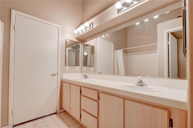 bathroom with vanity and a shower with curtain