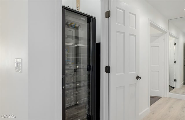 hallway featuring light wood-type flooring