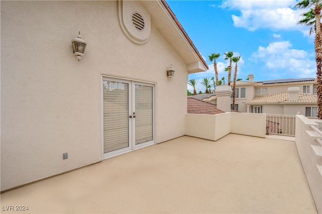 view of patio / terrace with a balcony