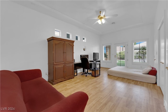 office space with light hardwood / wood-style flooring and ceiling fan