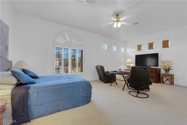 carpeted bedroom featuring ceiling fan