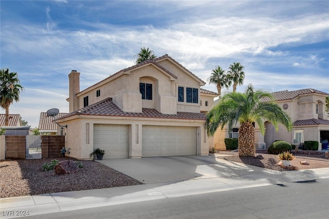 mediterranean / spanish-style home featuring a garage