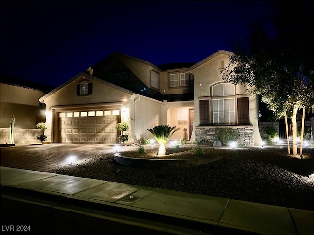 view of front of home with a garage