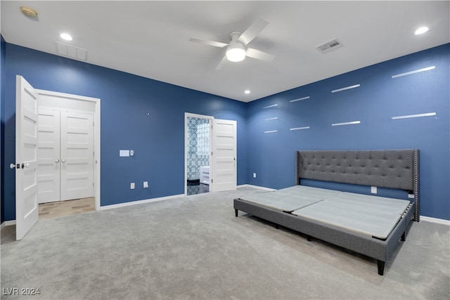 carpeted bedroom with ceiling fan