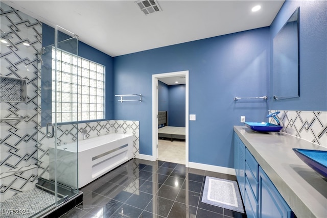 bathroom featuring vanity and plus walk in shower