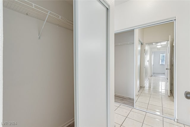 interior space featuring light tile patterned flooring