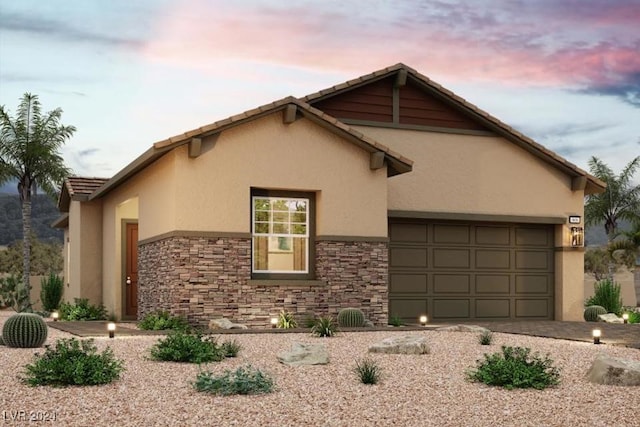 view of front of property featuring a garage