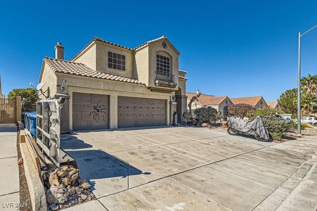 view of front of home with a garage