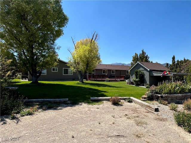 view of yard with a deck