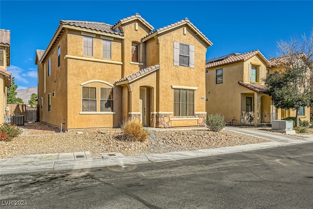 view of front of house with central AC unit