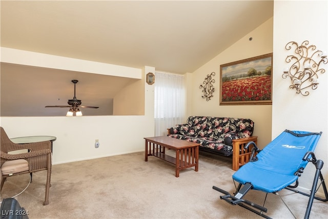 living room with lofted ceiling, light colored carpet, and ceiling fan