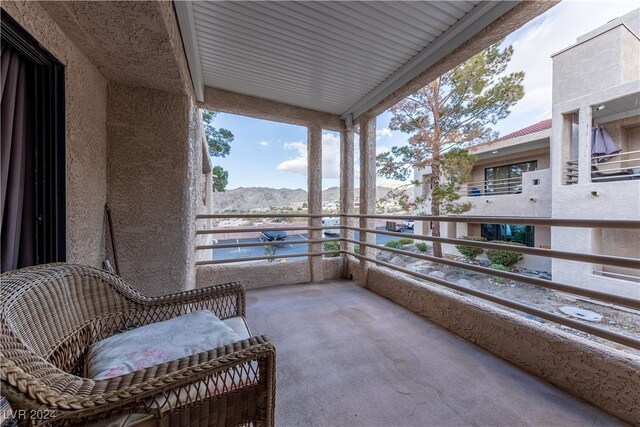 balcony featuring a mountain view