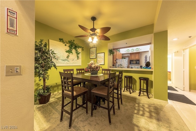 dining area with ceiling fan