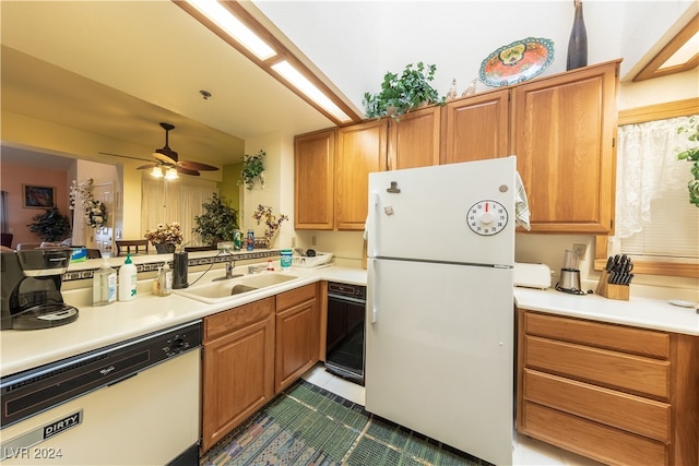 kitchen with ceiling fan, sink, and white appliances