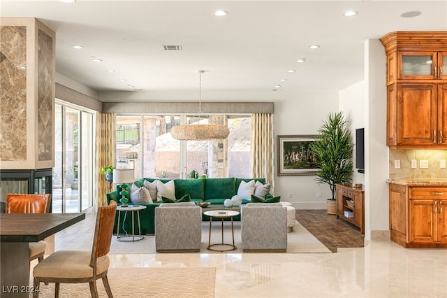 living room with plenty of natural light