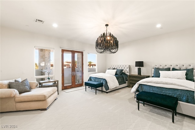 bedroom with a notable chandelier, french doors, and light colored carpet