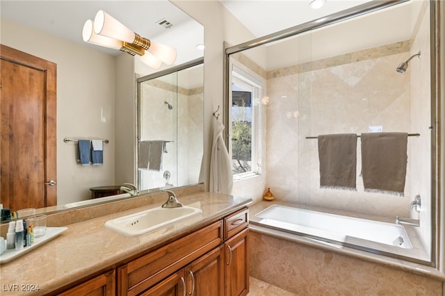 bathroom with vanity, tile patterned floors, and separate shower and tub