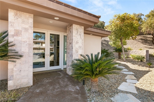 31 Eagles Landing Ln, Las Vegas, NV 89141 - property entrance featuring french doors and stucco siding