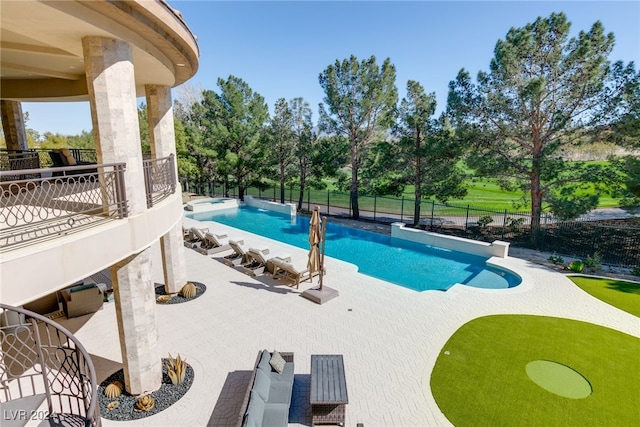 view of pool featuring a patio