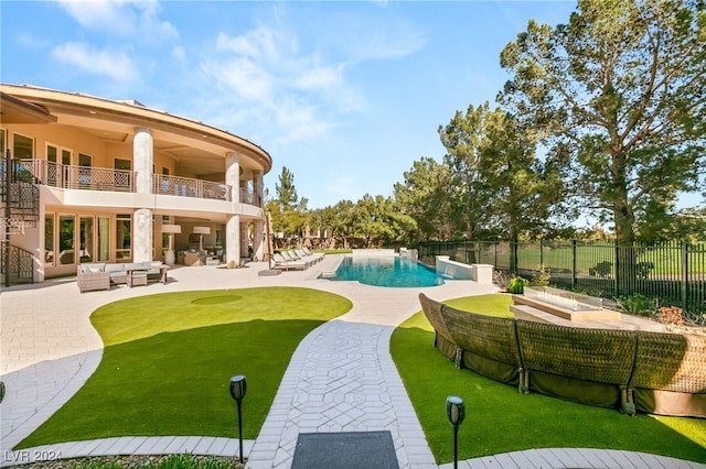 view of pool with a patio and an outdoor hangout area