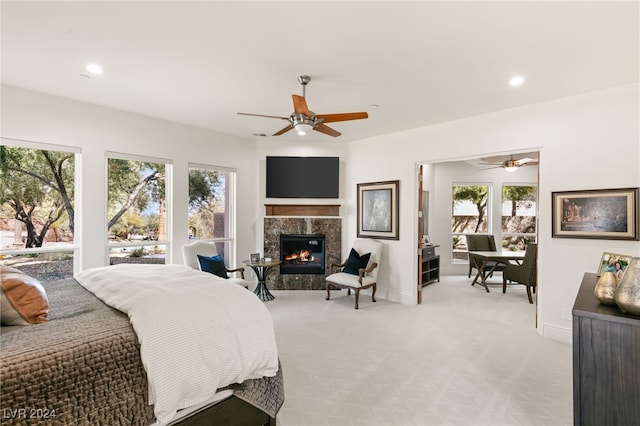 31 Eagles Landing Ln, Las Vegas, NV 89141 - bedroom with a premium fireplace, light colored carpet, recessed lighting, and ceiling fan