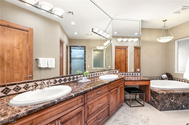 bathroom with vanity, tile patterned flooring, and plus walk in shower