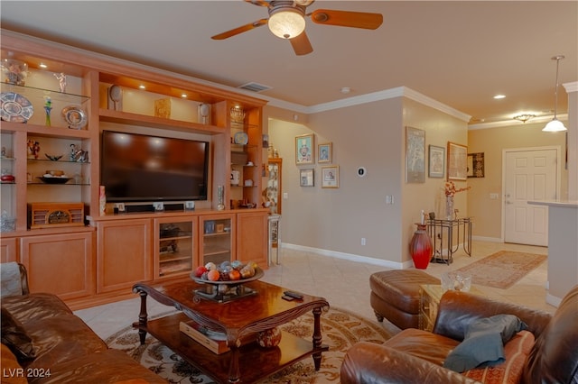 tiled living room with ornamental molding, built in features, and ceiling fan